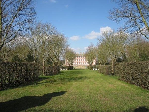 Photo taken with Canon IXUS 115 HS showing a landscape and mansion.