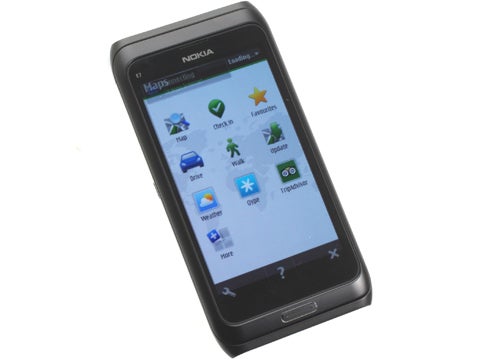 Nokia E7 smartphone displaying home screen on white background.