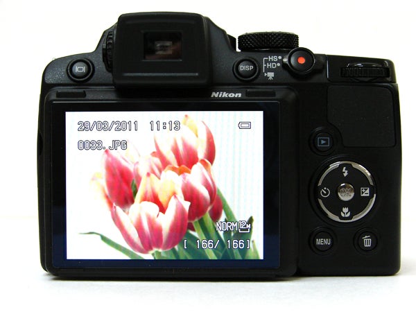 Nikon Coolpix P500 camera displaying a photo of tulips.