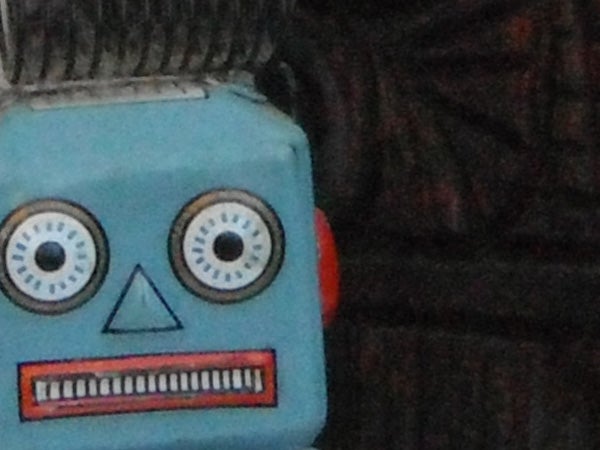 image of a small blue toy robot