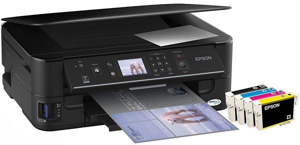 Epson Stylus SX525WD printer with ink cartridges.