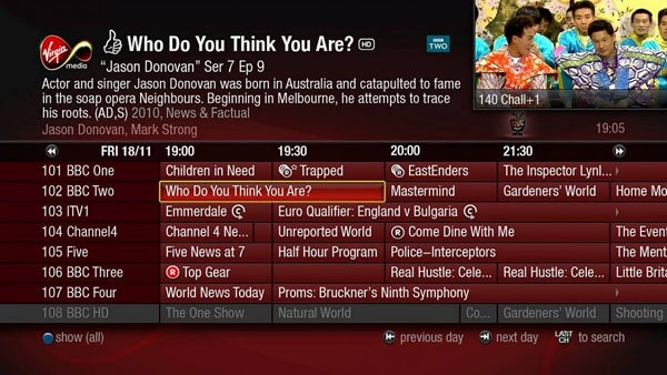 Virgin Media TiVo interface showing channel guide and show information.