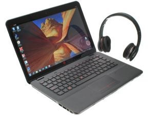 HP Envy 14 Beats Edition laptop with matching headphones.