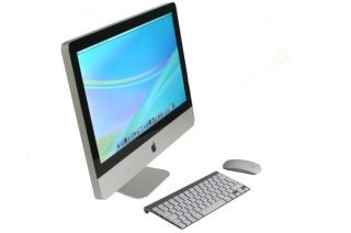 Apple iMac MC812B/A with wireless keyboard and mouse.