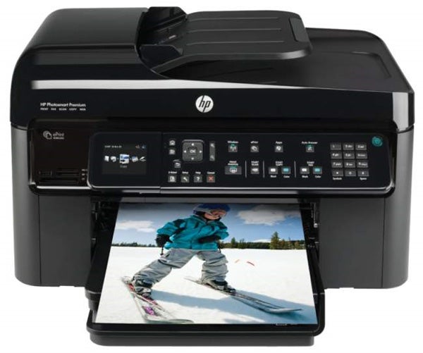HP Photosmart Premium Fax CQ521B printer with a color printout.