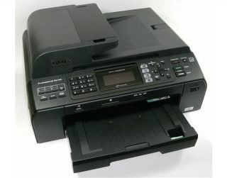 Brother MFC-5895CW printer with output tray extended.