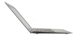 Side view of an open Apple MacBook Air 11-inch laptop.