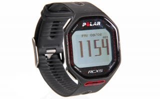 Polar RCX5 sports watch displaying time on white background.