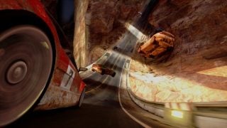 Racing cars on a canyon track in Trackmania 2: Canyon video game.