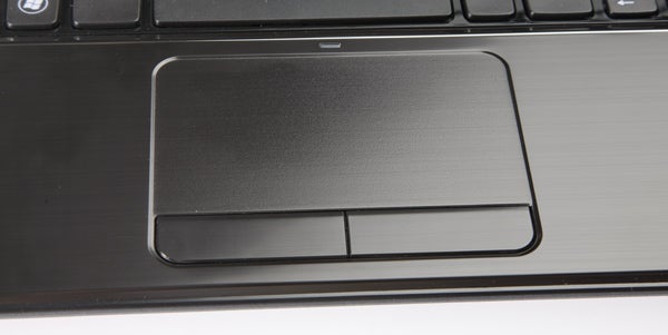 Close-up of Dell Inspiron 15R laptop touchpad and keyboard
