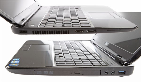 Dell Inspiron 15R laptop showing keyboard and ports.