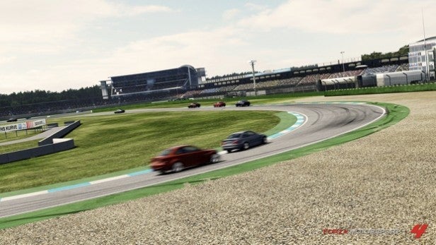 Screenshot of Forza Motorsport 4 gameplay with racing cars.