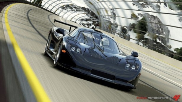 Screenshot from Forza Motorsport 4 featuring a racing car on track.