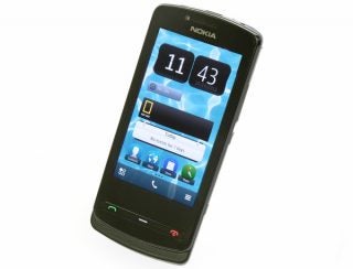Nokia 700 smartphone display showing date and time.