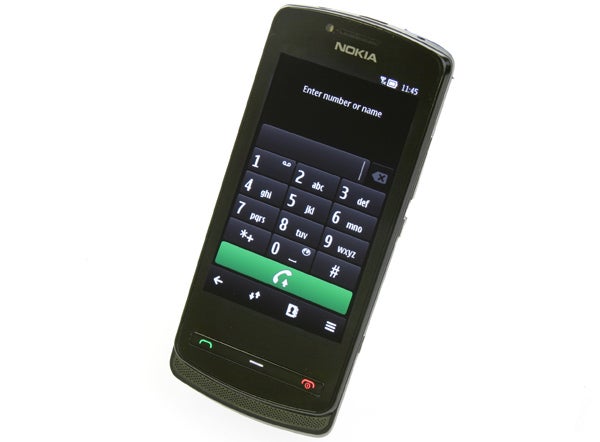 Nokia 700Nokia 700 smartphone showing keypad on screen.