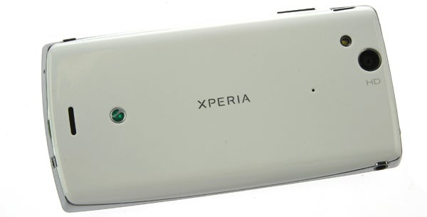 Sony Ericsson Xperia Arc S smartphone rear view.Sony Ericsson Xperia Arc S among other smartphones.Photo taken by Sony Ericsson Xperia Arc S camera.