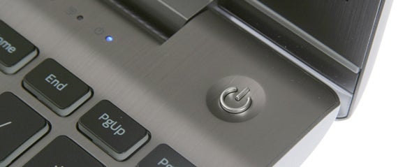 Samsung Series 7 Chronos 700Z5A laptop with balloon wallpaper.Close-up of Samsung Series 7 Chronos laptop power button.