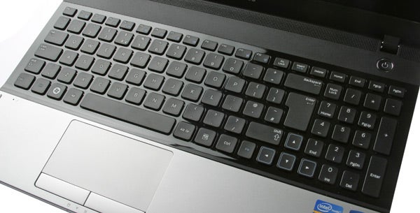 Close-up of Samsung NP300E5A laptop keyboard and touchpad.