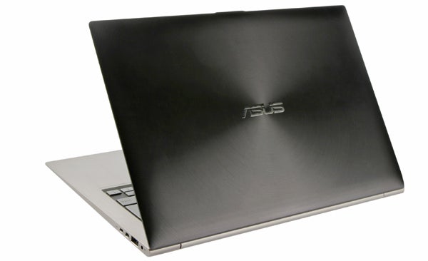 Asus Zenbook UX31 laptop with lid closed, showing ASUS logo.