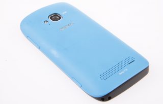 Blue Nokia Lumia 710 smartphone on white background.