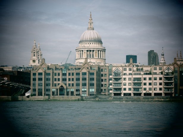 Photograph of St. Paul's Cathedral across the Thames River.