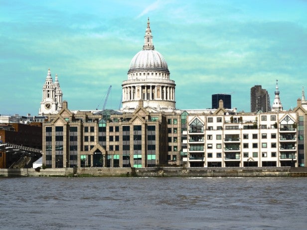 Photo of St. Paul's Cathedral across the Thames River.