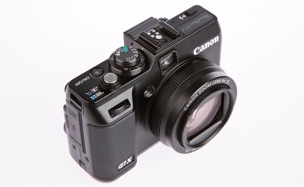 Canon PowerShot G1X camera on white background.