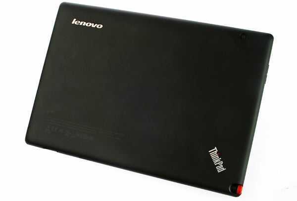 Side view of Lenovo ThinkPad Tablet showing ports and buttons.Person using stylus on Lenovo ThinkPad Tablet with keyboard behindLenovo ThinkPad Tablet with stylus pen inserted.Lenovo ThinkPad Tablet with keyboard stand in use.Lenovo ThinkPad Tablet with keyboard on white background.Lenovo ThinkPad Tablet with keyboard folio case.Lenovo ThinkPad tablet with attached keyboard case.Lenovo ThinkPad Tablet with a black leather case.Lenovo ThinkPad Tablet stylus on white background.Lenovo ThinkPad Tablet stacked on a black folio case.Lenovo ThinkPad Tablet in laptop and tent modes.Lenovo ThinkPad Tablet in a protective black case.Close-up of a Lenovo ThinkPad tablet keyboard.