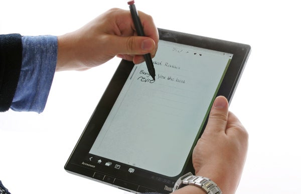 Side view of Lenovo ThinkPad Tablet showing ports and buttons.Person using stylus on Lenovo ThinkPad Tablet with keyboard behindLenovo ThinkPad Tablet with stylus pen inserted.Lenovo ThinkPad Tablet with keyboard stand in use.Lenovo ThinkPad Tablet with keyboard on white background.Lenovo ThinkPad Tablet with keyboard folio case.Lenovo ThinkPad Tablet with keyboard and person typing.Lenovo ThinkPad tablet with attached keyboard case.Lenovo ThinkPad Tablet with a black leather case.Lenovo ThinkPad Tablet stylus on white background.Lenovo ThinkPad Tablet stacked on a black folio case.Lenovo ThinkPad Tablet in laptop and tent modes.Lenovo ThinkPad Tablet in a protective black case.Hand writing on a Lenovo ThinkPad Tablet with a stylus.Close-up of a Lenovo ThinkPad tablet keyboard.