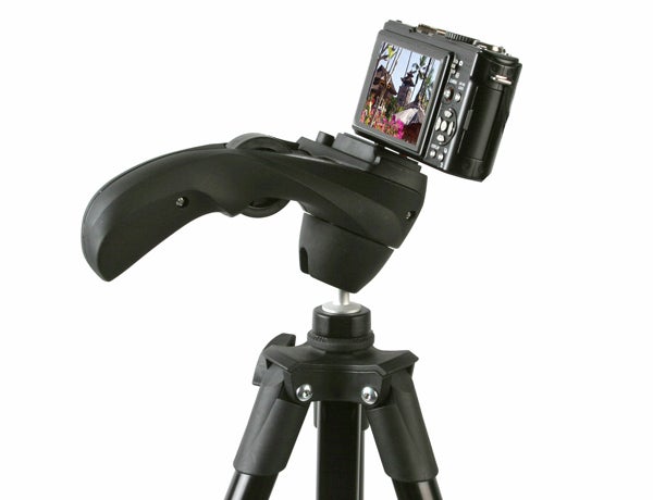 Manfrotto MKC3-H01 tripod with camera mounted on it.