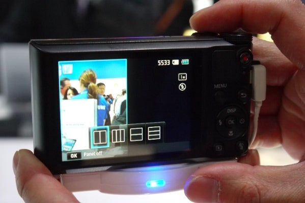 Samsung WB150F digital camera LCD screen displaying menu options.Hands holding Samsung WB150F camera with screen displaying a photo.