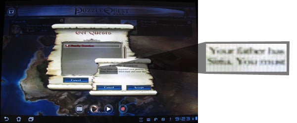 OnLive streaming service running Puzzle Quest game.OnLive game service interface and pixelated image quality.