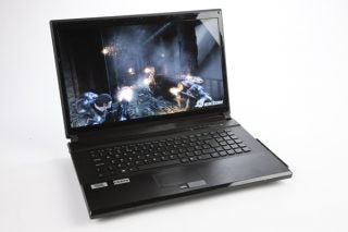 Wired2Fire Vector Elite gaming laptop with action game on screen