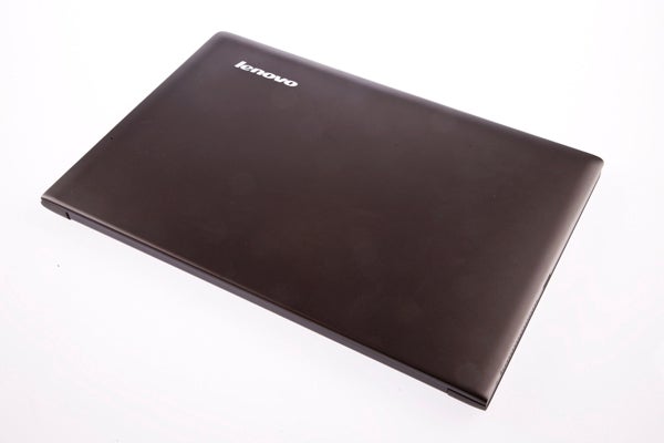 Lenovo IdeaPad U300s laptop underside view showing Intel sticker.Lenovo IdeaPad U300s laptop closed on white background.