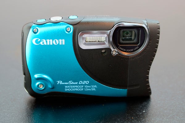 Canon PowerShot D20 camera on a dark surface.