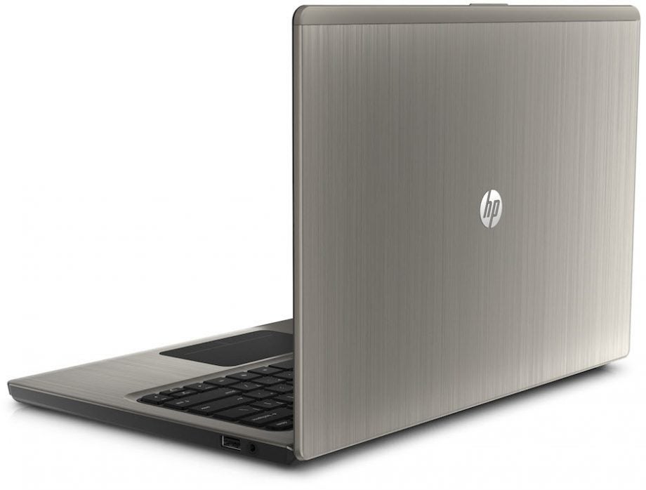 HP Folio 13 ultrabook side view with brushed metal finish.