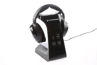 Sennheiser RS 220 headphones with charging dock on white background.
