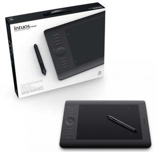 Wacom Intuos 5 graphics tablet with stylus and box.