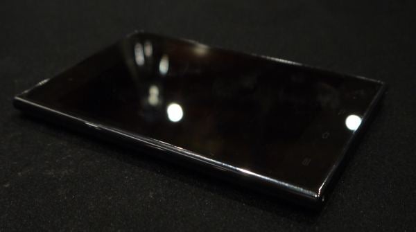 LG Optimus Vu smartphone on a dark surface.