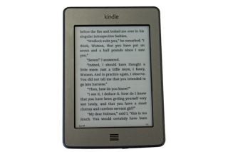 Amazon Kindle Touch displaying a page from Sherlock Holmes.