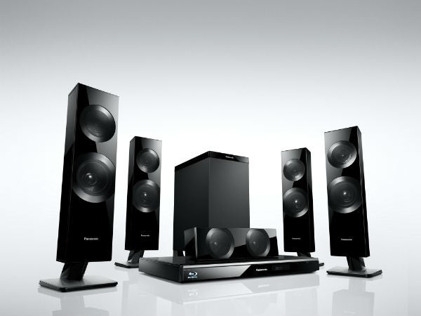 Panasonic SC-BTT590 home theater system with speakers.