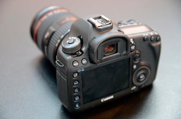Canon EOS 5D Mark III DSLR with lens on table.