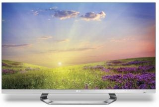 LG 42LM670T television displaying colorful sunset and field.