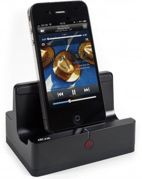 iPhone docked in ARCAM drDock with displayed album art.