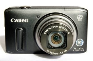 Canon PowerShot SX260 HS compact camera with lens extended.