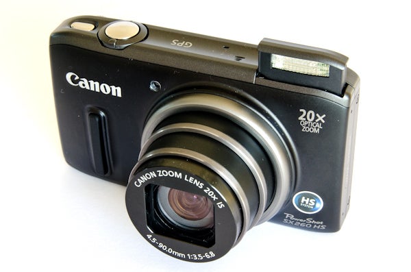Canon PowerShot SX260 HS digital camera on white background.