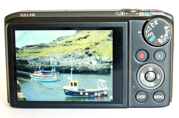 Canon PowerShot SX260 HS camera displaying a harbor scene.