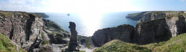 Panoramic photo of coastal cliffs and sea taken with Fujifilm camera.