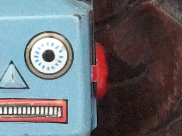 Close-up of vintage toy robot's face