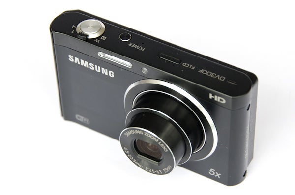 Samsung DV300F digital camera with lens extended.